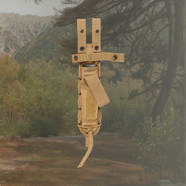 tan knife sheath on wooded background